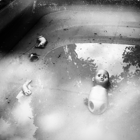 the doll in the pool