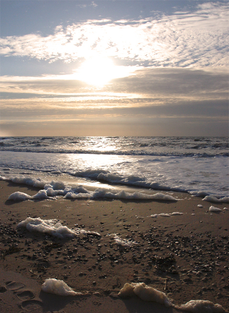 Zon, zee, strand en schuim