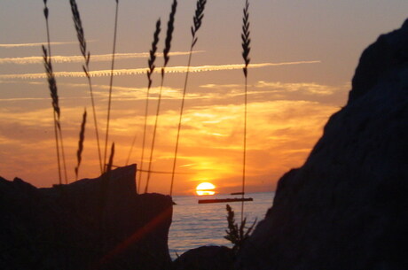 Zonsondergang aan Franse kust