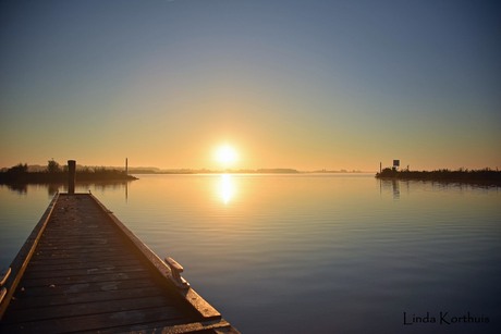 Zonsopkomst vanaf de steiger