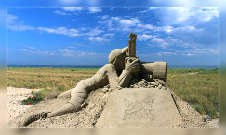 Een zandzoomer op het strand