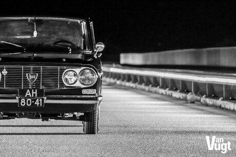 The old car on the new bridge