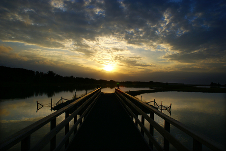 At the beginning of the brigde I see the end of the day