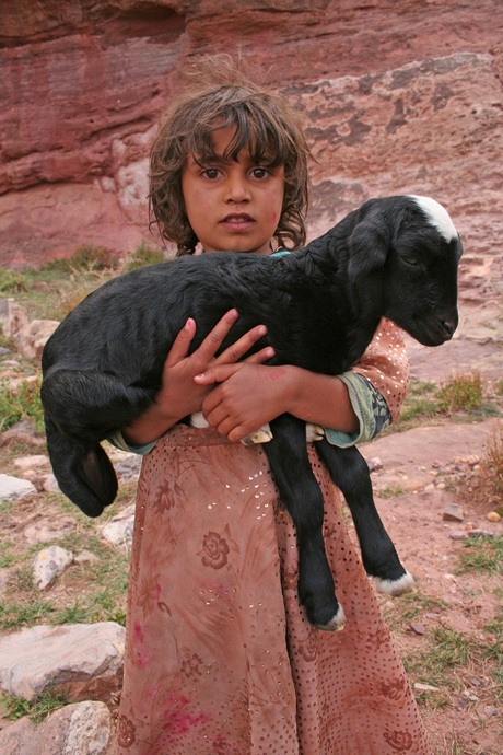 Young Girl carrying her Treasure