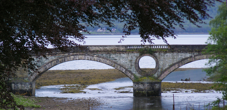 Bridge over still water