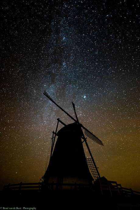 Dutch windmill grinding the Milky Way