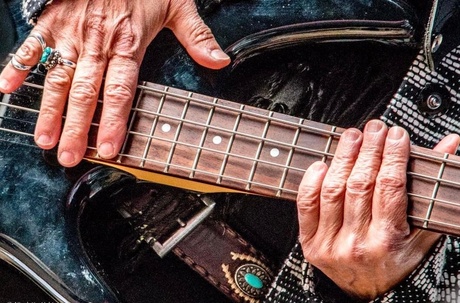 Hands of a guitar woman