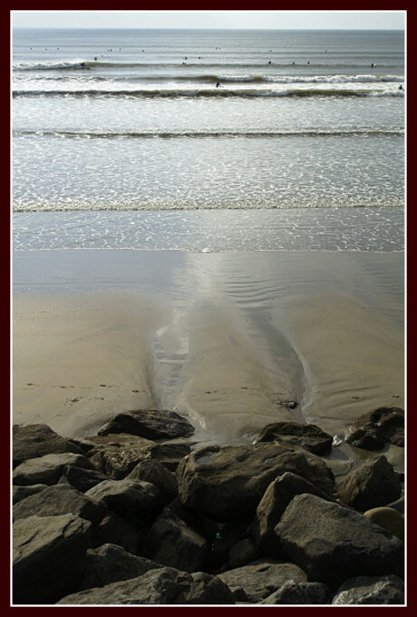 Surfers in lahinch