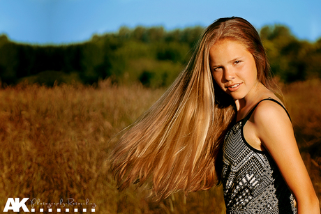 Playing with hair in sun