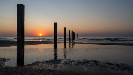 Zonsondergang op  het strand 