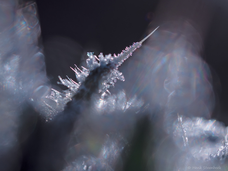 Breking van het licht in ijskristallen