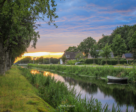 Zonsondergang met een bootje 