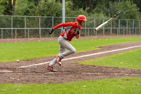 Slagman in stromende regen