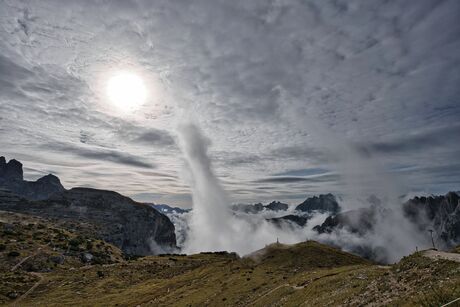Clouds touch the sun