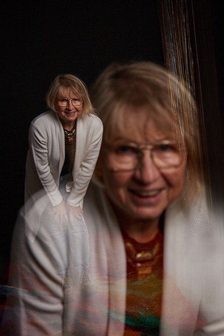 op mijn eigen schouder