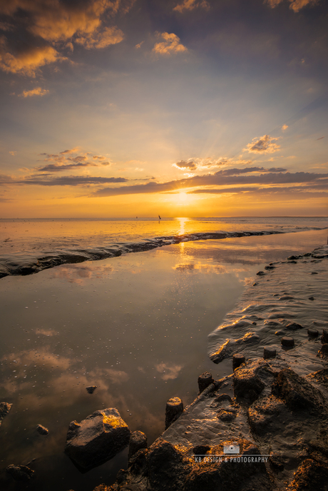 Een fijne zonsondergang aan de Waddenzee