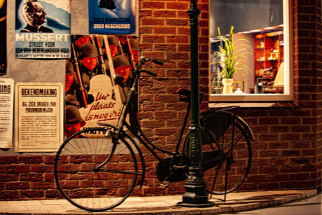 old bike near posters!