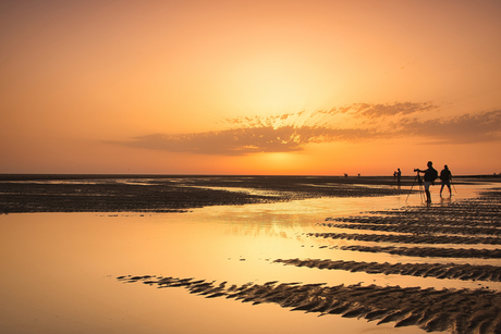 Zonsondergang aan het strand