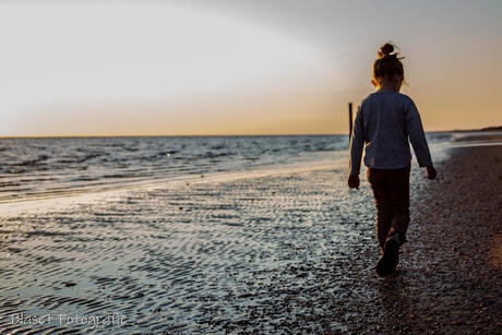 Little girl by the sea