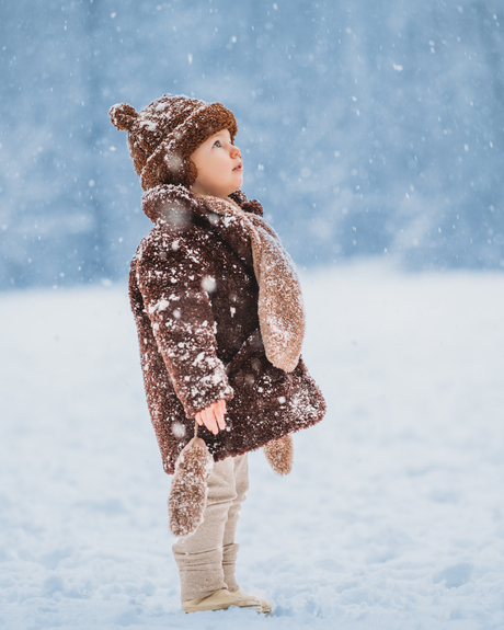 Kind in de sneeuw 