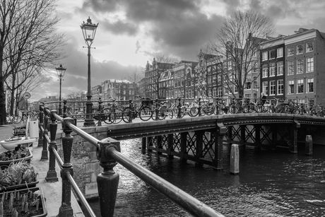 Bicycle parking over the troubled water, Amsterdam Netherlands