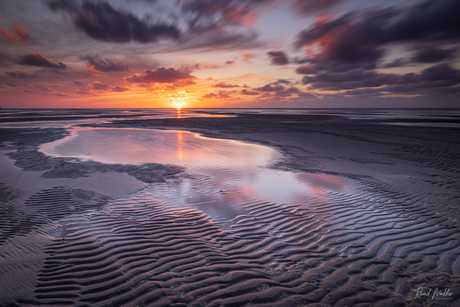 Zonsondergang bij de vuurtoren van Texel