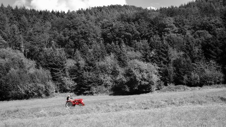 De kleine rode tractor 