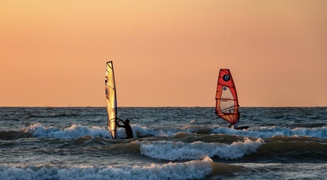 Surfing at sunset