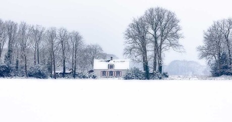 Little house in the snow
