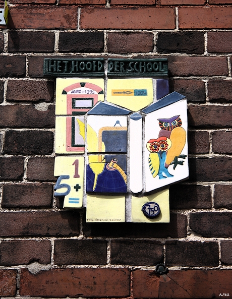  Het hoofd der school  