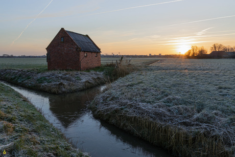 Waterige zonsopkomst