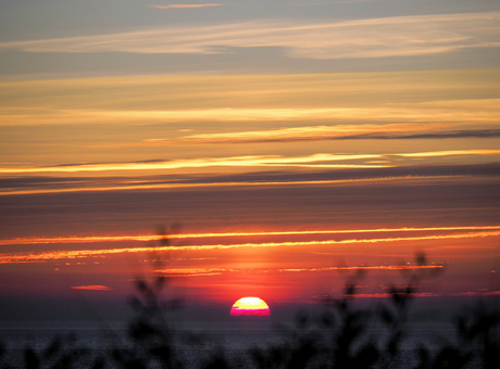 Herfstkleuren bij zonsondergang