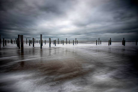 Palen in de branding