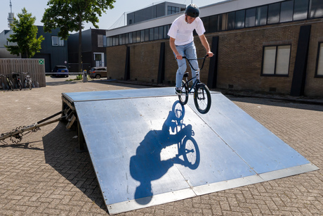 BMX-er Bruno Colautti landing on his shadow