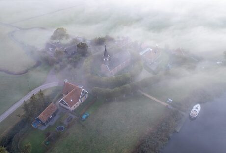 Vlucht langs Sandfirden