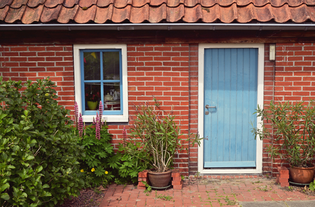 Het huisje met de blauwe deur
